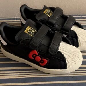adidas Kids Black and White Sneakers with Red Bow Accent